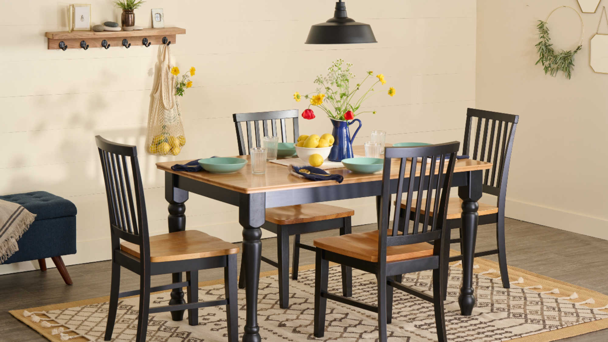 A brand new table and chairs, crafted by associates through DI Manufacturing, showcased within a home.